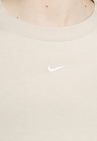 Nike Sportswear Žerzejové šaty - beige