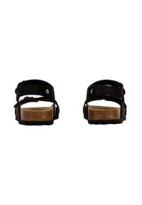 Sorte sandaler med to justerbare remme, en struktureret korksål og en robust gummiyderside. Designet til afslappet brug.