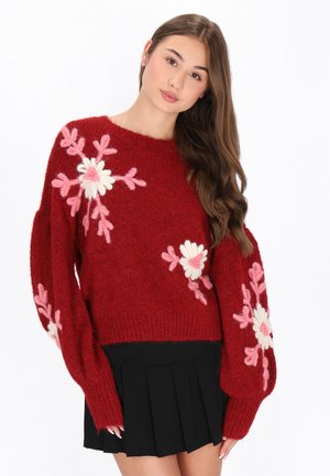 - Sweter