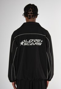 Love Scars COACH TRACK UNISEX - Treniņjaka - midnight purple
