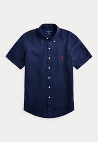 Short-sleeve navy blue button-up shirt made of linen, featuring a collar, white buttons, and a red embroidered logo on the chest.