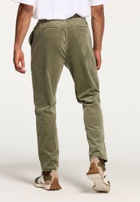 Shiwi CORDUROY RIB - Spodnji deli trenirk - uniform green