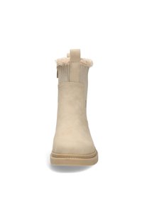 Beiga ankelskor i mjuk mocka, med en mjuk, strukturerad fleecekrage och en räfflad gummisula för grepp. Dragband bak ingår.