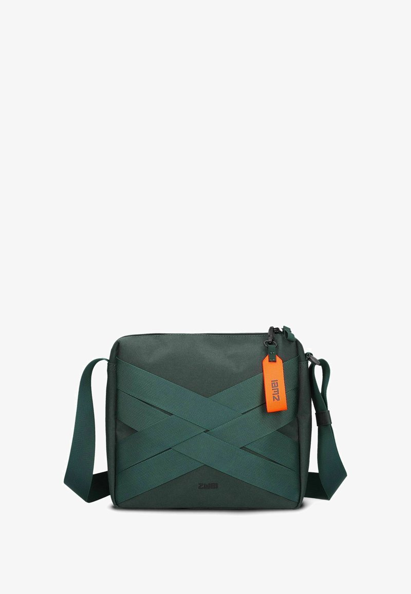 Borsa a tracolla verde scuro realizzata in materiale texturizzato, con cinturini incrociati e un'etichetta arancione. Tracolla regolabile attaccata.