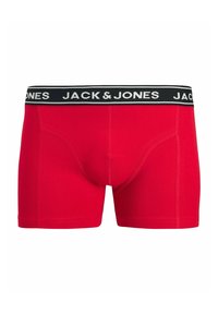 Røde boxershorts med en sort linning, der har teksten "JACK & JONES" i hvid. Glat tekstur, almindelig pasform og ingen synlige mønstre.
