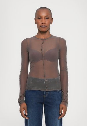 Sheer long-sleeve top in brown, featuring a buttoned front, textured fabric, and a fitted bodice with a layered design over a bra.