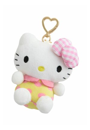 Plush white cat keychain with black eyes, yellow nose, pink checkered bow, pink collar, yellow body with pink polka dots, and gold heart-shaped clip.
