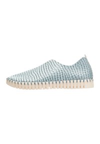 Light blue slip-on shoes with a textured, scaled surface and a cream-colored, ridged sole. Minimalistic design with a rounded toe.