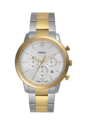 Men’s Fossil wristwatch with silver and gold metal band, white dial, gold bezel, three subdials, and date window at 4 o’clock.