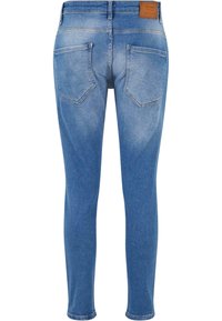 Kék farmer skinny farmernadrág közepes derékkal, öt zsebbel és kopott mosással. Hátoldalán bőrből készült márkajelzés található.