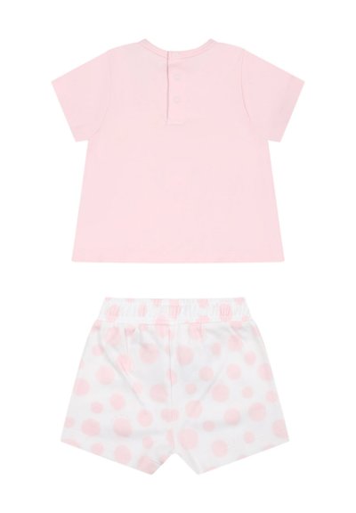 T-shirt rosa a maniche corte con bottoni sulla schiena e pantaloni bianchi con pois rosa. Materiale in cotone morbido, design semplice.