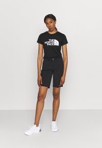 The North Face EASY - Potiskana majica - black