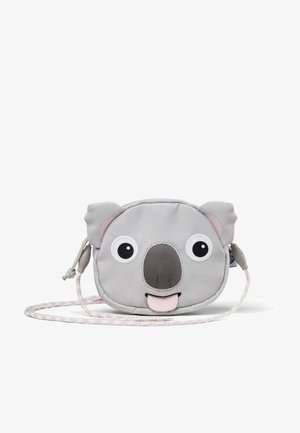 Gray koala-shaped crossbody bag with large eyes, pink accents, and a textured finish. Features a detachable strap and zipper closure.