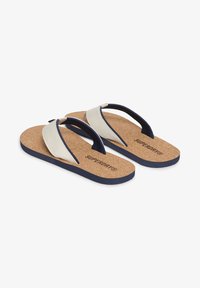 Infradito blu e beige con sole in sughero, cinturini elastici e suole testurizzate. Logo sul piede in stampa scura.