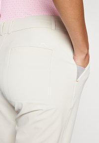 Kjus WOMEN COLLAGEN STRAIGHT PANTS - Calças - oyster