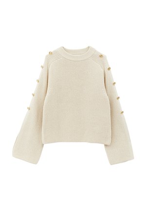 Jersey de punto color crema con textura acanalada, mangas anchas y detalles de botones dorados en los hombros. Cuello redondo y diseño corto.