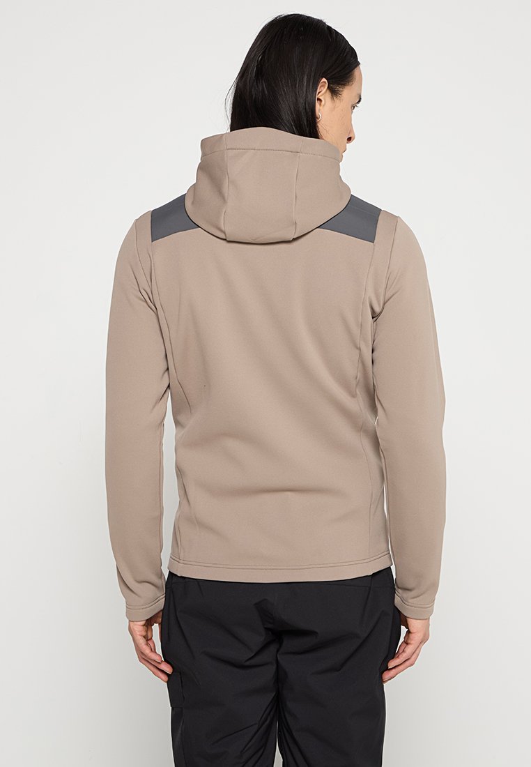 Jasno-beżowy hoodie z zamkiem z przodu, regulowanym kapturem i ciemnoszarymi akcentami na ramionach, wykonany z teksturowanego, elastycznego materiału.