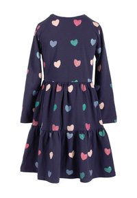 Laivaston sininen pitkähihainen mekko, jossa on kerroksellinen muotoilu ja värikkäitä kimaltavia sydänkuvioita vaaleanpunaisena, vihreänä ja sinisenä koko kankaan alueella.