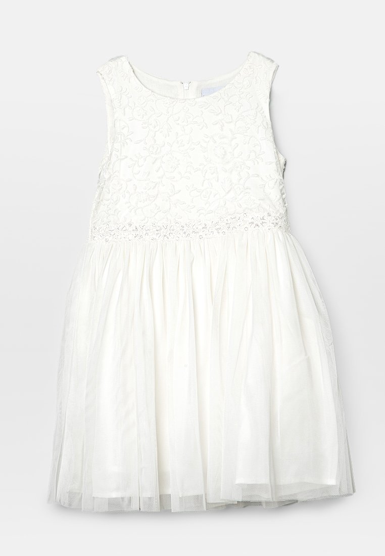 Robe blanche présentant un corsage en dentelle florale, une taille cintrée et une jupe en tulle superposée. Comprend une fermeture éclair au dos.