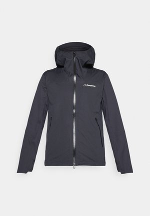 Musta vedenpitävä takki hupulla, edessä vetoketju ja kaksi sivutaskua. Takissa on sileä pinta ja logo rinnassa.