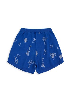 Shorts en tricot bleu avec motifs blancs en contour représentant des chiens, des plantes, des oiseaux et des feuilles répartis uniformément sur le tissu.