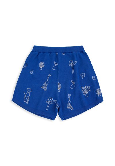 Shorts en tricot bleu avec motifs blancs en contour représentant des chiens, des plantes, des oiseaux et des feuilles répartis uniformément sur le tissu.