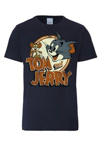 Dark navy cotton t-shirt featuring a vintage-style graphic print of Tom and Jerry within a circular design. Text reads "TOM and JERRY."