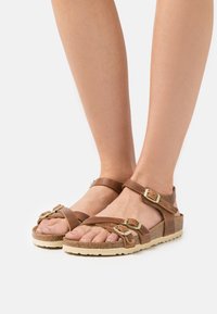 Birkenstock KUMBA NARROW - Riemensandalette - cognac