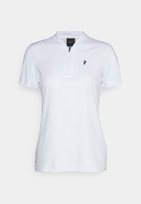 Polo shirt blanc à manches courtes avec une demi-fermeture éclair et un logo noir sur la poitrine gauche. Tissu lisse et léger avec une coupe classique.