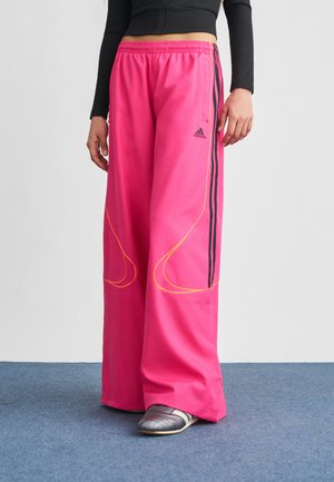 TEAMGEIST - Pantaloni de trening - real magenta/black/lucid orange