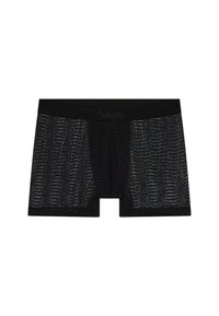 Boxers noirs en matière transparente, présentant un motif zigzag texturé et une large ceinture élastique avec le logo "Aubade".