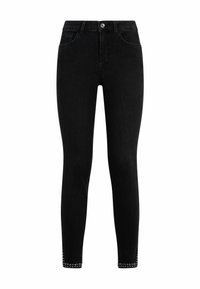 Jeans skinny in denim nero con vita alta, dotati di dettagli con borchie alla caviglia e design tradizionale a cinque tasche.