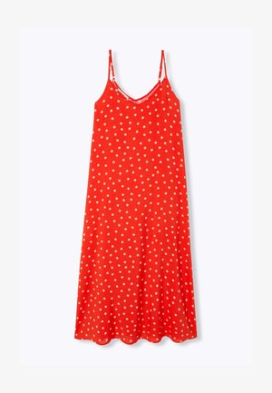 Robe midi rouge sans manches avec fines bretelles et pois blancs, dotée d'un décolleté en V et d'une silhouette fluide.