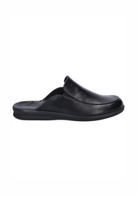 Black leather slip-on shoes with a rounded toe and minimalistic design. Features a smooth texture and rubber sole for comfort.