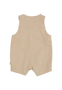 Beige ärmelloser Overall aus strukturiertem Stoff, mit rundem Armausschnitt und einer genähten Rückennaht. Die Shorts haben eine lockere Passform und abgerundete Beinausschnitte.