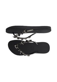 Black flip-flops featuring textured soles, embellished straps with clear and black stones, and metallic accents for added detail.