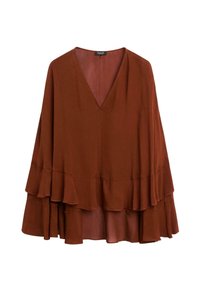 Blusa di colore ruggine con profondo scollo a V, silhouette fluida e orlo a strati con volant. Realizzata in un tessuto leggero e testurizzato.