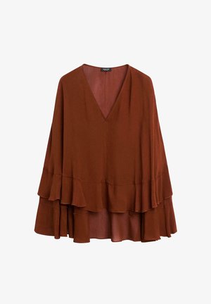 Rust-colored blouse featuring a deep V-neck, flowing silhouette, and layered ruffle hem. Made from a lightweight, textured fabric.