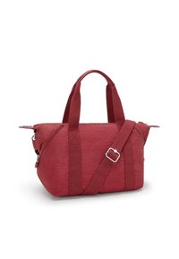Red fabric handbag with dual handles and a detachable strap. Features a zip closure, textured surface, and silver hardware accents.