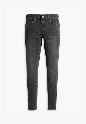 Schmal geschnittene schwarze Jeans aus Denim mit einer verwaschenen Textur, fünf Taschen und einem ausgefransten Saum am Knöchel. Einzelner Metallknopfverschluss an der Taille.