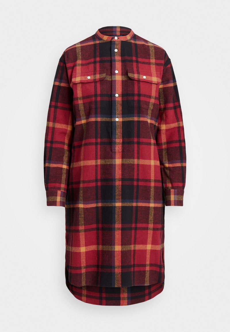 Abito camicia a maniche lunghe a quadri rossi, neri e gialli con colletto rialzato, chiusura frontale a bottoni e due tasche con patta sul petto.