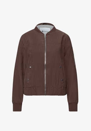 Blouson aviateur marron avec une fermeture éclair à l'avant, des poches latérales, des poignets côtelés et un col rond. Confectionné dans un tissu léger à la texture lisse.