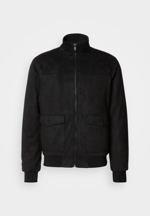 Black suede bomber jacket with a high collar, zip closure, and two front pockets. Features ribbed cuffs and hem for a snug fit.