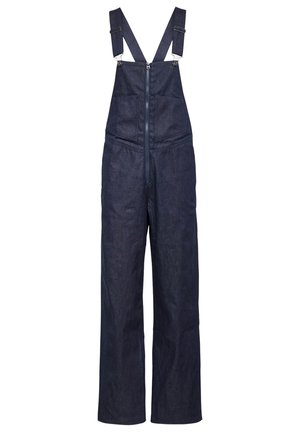 Tummasta denimitrikoota säädettävillä olkahihnoilla, etuvetoketjulla ja kahdella etutaskulla; leveälahkeinen design ja sileä pinta.