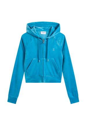 Felpa con cappuccio accorciata in velluto blu brillante. Presenta tasche frontali e una cerniera argentata. Texture liscia con una leggera lucentezza.