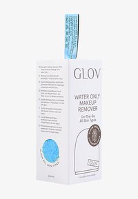 Biały prostokątny pojemnik opakowaniowy oznaczony "GLOV WATER ONLY MAKEUP REMOVER," z niebieskim teksturowanym akcentem i pętelką do zawieszania.