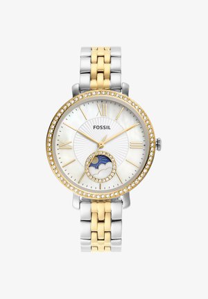 Round Fossil wristwatch with gold and silver link band, crystal-lined bezel, white dial, gold Roman numerals, and a sun and cloud subdial at 6 o'clock.