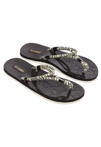 Schwarze Flip-Flops mit gemusterten Riemen in Schwarz und Creme, ausgestattet mit einer strukturierten Fußbett mit Blumendesign und einer weißen Gummisohle.