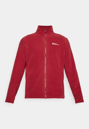 Red fleece jacket with a high collar, full front zipper, and logo on the left chest. Soft texture with long sleeves and side pockets.