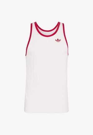 Bílé tílko Adidas bez rukávů s červeným lemem a červeným logem Adidas na levé horní části hrudi.